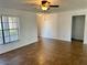 Bright living room with tile floors and large windows at 1493 Providence Blvd, Deltona, FL 32725