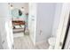 Clean bathroom with toilet, copper sink, and walk-in shower at 152 Coleman St, Edgewater, FL 32141