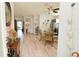 Bright and airy entryway with hardwood floors and access to kitchen at 152 Coleman St, Edgewater, FL 32141