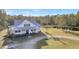 Aerial view of a house and pond at 153 Ashby Cove Ln, New Smyrna Beach, FL 32168