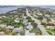 Aerial view showcasing the home's convenient location near the beach, city, and a bridge at 1916 S Peninsula Dr, Daytona Beach, FL 32118