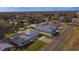 Aerial view of a home with pool and detached garage, situated on a quiet street at 2003 12Th St, Edgewater, FL 32132