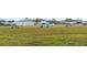 Small airplanes parked on a grassy airstrip at 2003 12Th St, Edgewater, FL 32132