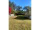 Spacious backyard with grassy lawn and privacy fence at 2017 Royal Palm Dr, Edgewater, FL 32141