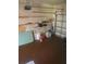 Attached garage with shelving and ample storage space at 2017 Royal Palm Dr, Edgewater, FL 32141