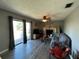 Living room with fireplace and sliding glass doors at 217 Avon St, Port Orange, FL 32127