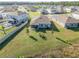 Aerial view showing home's backyard, spacious lot, and surrounding community at 270 Eagle Harbor Way, Daytona Beach, FL 32124