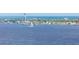 Aerial view of waterfront homes and sailboats at 2801 S Ridgewood Ave # 1215, South Daytona, FL 32119