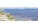 Waterfront homes with private docks and city skyline in distance at 2801 S Ridgewood Ave # 1215, South Daytona, FL 32119