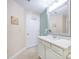 Clean bathroom with single sink vanity and storage at 2801 S Ridgewood Ave # 1215, South Daytona, FL 32119