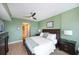 Bedroom with king bed and access to bathroom at 2801 S Ridgewood Ave # 1215, South Daytona, FL 32119