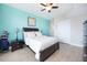 Bedroom with light walls and king-size bed at 2801 S Ridgewood Ave # 1215, South Daytona, FL 32119