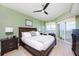 Bedroom with water views and king-size bed at 2801 S Ridgewood Ave # 1215, South Daytona, FL 32119