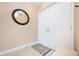 Inviting entryway with double doors and a small bench at 2801 S Ridgewood Ave # 1215, South Daytona, FL 32119