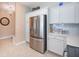 Modern kitchen with stainless steel appliances and white cabinets at 2801 S Ridgewood Ave # 1215, South Daytona, FL 32119