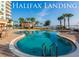 Inviting community pool with surrounding lounge area at 2801 S Ridgewood Ave # 1215, South Daytona, FL 32119