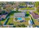 Bird's eye view of the house, pool, and backyard at 2919 Pine Tree Dr, Edgewater, FL 32141