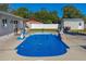 Inviting swimming pool with a concrete deck at 2919 Pine Tree Dr, Edgewater, FL 32141