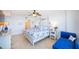 King bedroom with ocean view, tile floors, and coastal decor at 3311 S Atlantic Ave # 802, Daytona Beach, FL 32118
