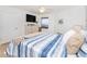 Comfortable bedroom with TV and ocean view at 3311 S Atlantic Ave # 802, Daytona Beach, FL 32118