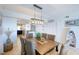 Coastal-themed dining room with a large table and six chairs at 3311 S Atlantic Ave # 802, Daytona Beach, FL 32118