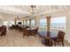 Oceanfront game room with multiple tables and chairs at 3311 S Atlantic Ave # 802, Daytona Beach, FL 32118
