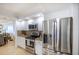 Modern kitchen featuring stainless steel appliances and granite countertops at 3311 S Atlantic Ave # 802, Daytona Beach, FL 32118