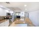 Modern kitchen with granite countertops and stainless steel appliances at 3311 S Atlantic Ave # 802, Daytona Beach, FL 32118
