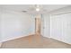 Bright bedroom with ceiling fan and ample closet space at 3313 Celena Cir, St Cloud, FL 34769