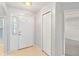 Bright entryway with coat closet and tiled floor at 3313 Celena Cir, St Cloud, FL 34769