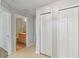 Hallway with two closets and access to bathroom at 3313 Celena Cir, St Cloud, FL 34769