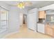 Bright kitchen with light wood cabinets and modern appliances at 3313 Celena Cir, St Cloud, FL 34769