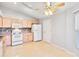 Bright kitchen featuring wood cabinets and tiled floor at 3313 Celena Cir, St Cloud, FL 34769