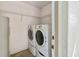 Laundry room with washer, dryer and shelving at 3313 Celena Cir, St Cloud, FL 34769