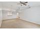 Open living room with high ceilings and neutral colors at 3313 Celena Cir, St Cloud, FL 34769
