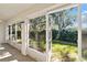 Screened porch with door to backyard at 3313 Celena Cir, St Cloud, FL 34769