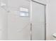 Walk-in shower with tiled walls and grab bar at 3313 Celena Cir, St Cloud, FL 34769