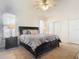 Bright bedroom featuring a king-size bed and built-in drawers at 3331 Torre Blvd, New Smyrna Beach, FL 32168