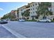 Street view of shops and parked cars in a community at 3331 Torre Blvd, New Smyrna Beach, FL 32168