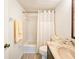 Updated bathroom with tub/shower combo and new flooring at 3606 S Peninsula Dr # 404, Port Orange, FL 32127