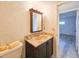 Guest bathroom with vanity and a view of another room at 3606 S Peninsula Dr # 404, Port Orange, FL 32127