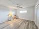 Bright bedroom with hardwood floors and ceiling fan at 3606 S Peninsula Dr # 404, Port Orange, FL 32127