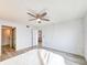 Spacious bedroom with hardwood floors and access to other rooms at 3606 S Peninsula Dr # 404, Port Orange, FL 32127