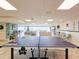 Relaxing game room with ping pong and seating area at 3606 S Peninsula Dr # 404, Port Orange, FL 32127