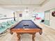 Game room boasts a pool table and comfortable seating at 3606 S Peninsula Dr # 404, Port Orange, FL 32127