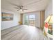 Living room with water view and sliding doors to balcony at 3606 S Peninsula Dr # 404, Port Orange, FL 32127