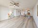 Living area with light flooring and ceiling fan at 3606 S Peninsula Dr # 404, Port Orange, FL 32127