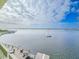 Stunning view of the water, sailboat, and bridge at 3606 S Peninsula Dr # 404, Port Orange, FL 32127