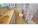 Bathroom with bathtub and sink at 40 Sandra Cir, New Smyrna Beach, FL 32168