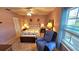 Bedroom with double bed and recliner at 40 Sandra Cir, New Smyrna Beach, FL 32168